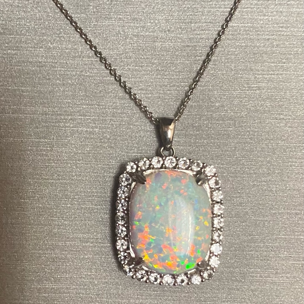 Lab created opal necklace. Sterling silver, never worn from Zales.
